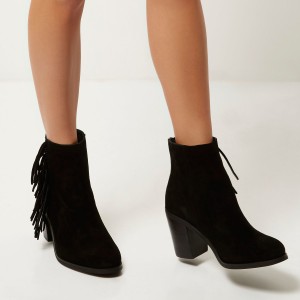 Black suede fringed ankle boots